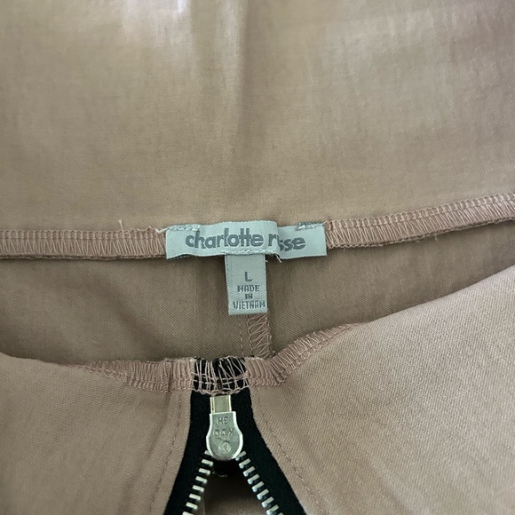 Mauve colored top and shorts.
Stretchy - Picture 10 of 12